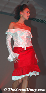 frilly white top with red skirt on model